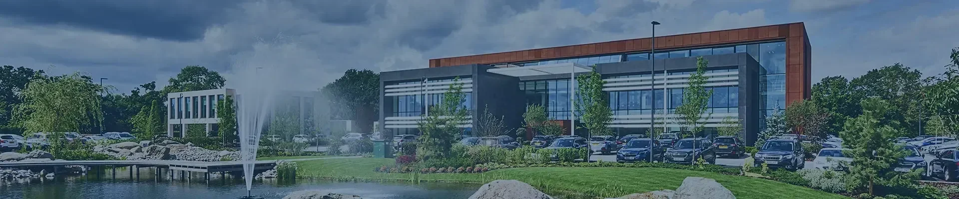Modern building with water fountain outside